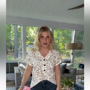 Fun leopard print cream top by Heimish size small new